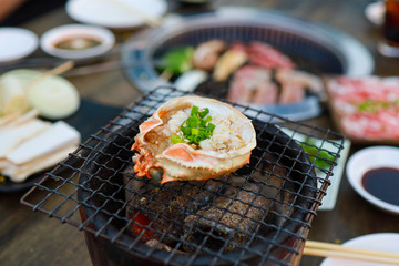 Kani Miso is a Japanese dish made from crab meat  grilled crab's head on a stove.