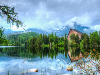 Fototapeta premium Strbske pleso - picturesque mountain lake, top tourist destination in the High Tatras, Slovakia