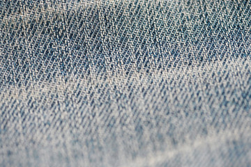 Jeans denim texture close up , focus only one point , soft blured background wallpaper