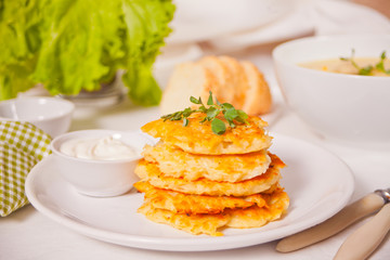 Hash browns potato pancakes draniki on the white plate. Breakfast.