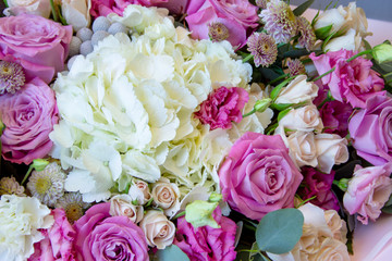 Fresh composition of bright flowers close-up work of florist decorative background