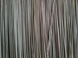 The bamboo leaves of brown thatched roof, used as background. Abstract natural roof background