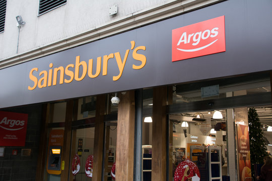 London- Sainsbury's supermarket exterior with Argos logo,  British supermarket chain signage