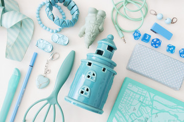 Group of objects in light blue color. Accessories at home. Close up composition.
