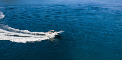 Speed boat in mediterranean sea, aerial view