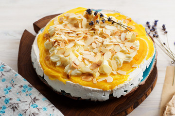 Dessert Pavlova. Meringue, lemon kurd, butter cream and almond flakes. Tasty and beautiful treat