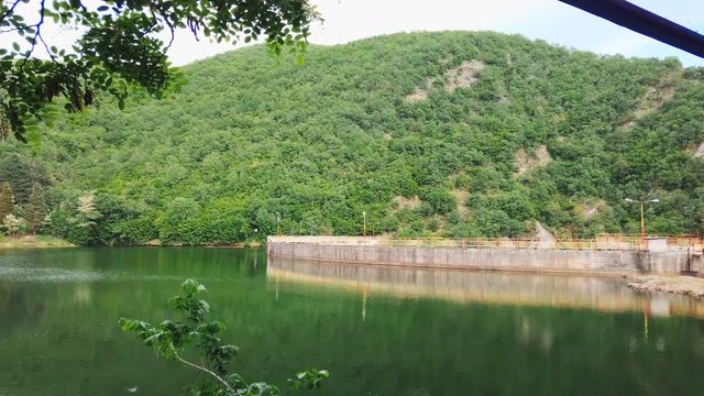 Fantastic scene on lake with dam crawn in spring