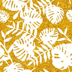 Tile tropical vector pattern with white exotic leaves on golden background for seamless decoration wallpaper