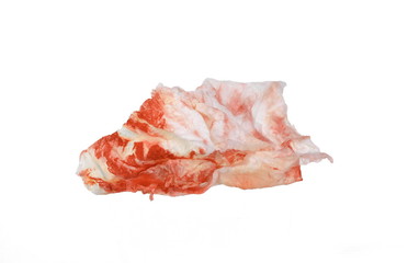 Blood in tissue paper on a white background. Epistaxis (nosebleeds) treatment blood in tissue paper. Health medical treatment concept.