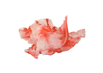 Blood in tissue paper on a white background. Epistaxis (nosebleeds) treatment blood in tissue paper. Health medical treatment concept.
