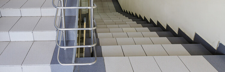 The interior staircase between floors in high-rise building