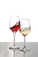 Crystal glass with red and white wine