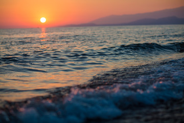 Fototapeta na wymiar beautiful sunset by the sea