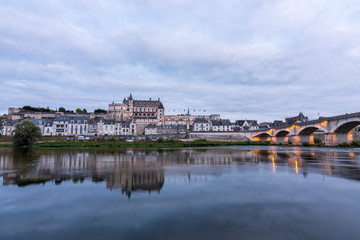 Fototapeta na wymiar Aboise city on the Loire river with its castle on a summer night. (France)
