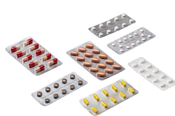 Pills and tablets in blisters. Top view. Various treatments mixed.