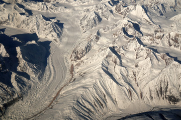 Nature scene - Aerial top view of Snow Mountain of himalaya mountains on sunny day winter season at Leh Ladakh , Jammu and Kashmir , India  - Beautiful White snow nature Texture Background 