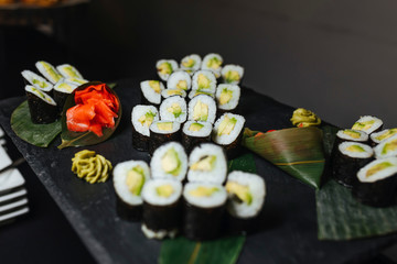 Sushi roll with fish and vegetables