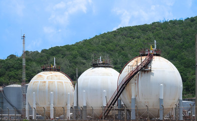 Gas Storage Sphere Tanks in petrochemical plant blue sky background