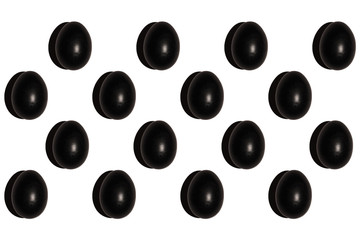 Black colored eggs pattern on white background. Hardlight. Isolated.