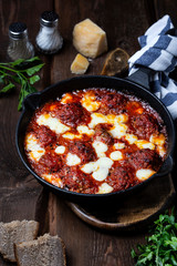 Meatballs with tomato sauce and mozzarella cheese