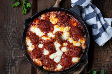 Meatballs with tomato sauce and mozzarella cheese
