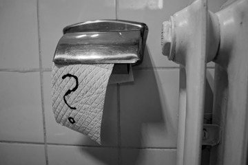 Toilet paper with hand drawn question mark