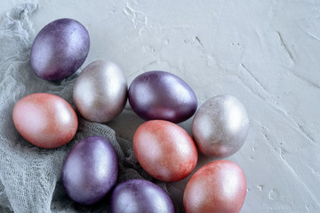 Easter greeting card with colorful easter eggs. Top view with space for your text.