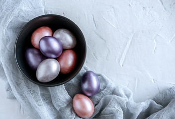 Easter greeting card with colorful easter eggs. Top view with space for your text.