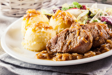 Braised pork loins with onion sauce