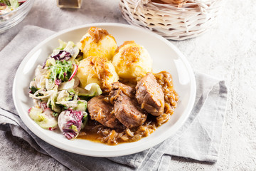Braised pork loins with onion sauce