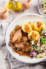 Braised pork loins with onion sauce