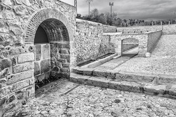 Old fountain, Noblejas, Spain. Located in the outcrop of a natural spring, it was used as a traditional fountain-laundry.