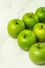 green apples on a white background close-up
