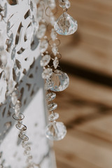 crystal wedding decor on wooden background