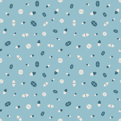 Pills seamless vector pattern in blue colors. Medicine themed surface print design. For healthcare related projects.