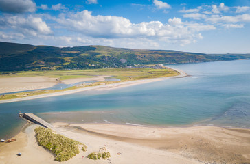 Aerial view of Fairbourne Point and Afon Mawddach Estuary with Barmouth Beach, Snowdonia, Wales, UK