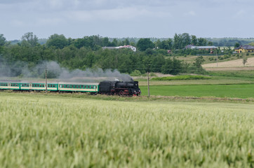 STEAM LOKOMOTIVE - A beautiful old train on the railway route
