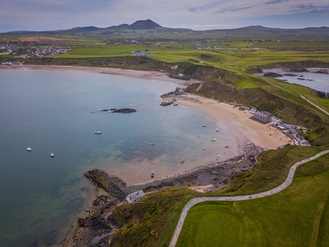 Aerial view of Porthdinllaen village and golf course, Morfa Nefyn, Llyn Peninsula, Gwynedd, Wales, UK