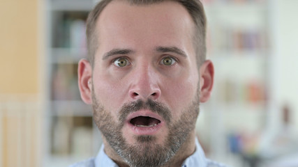 Close Up of Worried Young Man Feeling Shocked