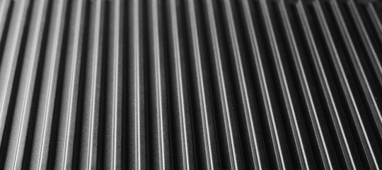 New grill metal surface, background and texture, side view