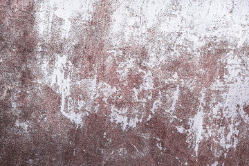 Concrete gray wall with peeling white paint texture or background. High contrast and resolution image with place for text. Template for design