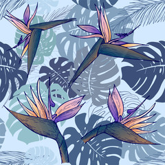 Strelitzia and monstera leaves on gray background. Seamless pattern. Vector illustation. Perfect for printing on fabric, paper for scrapbooking, gift wrap and wallpaper.