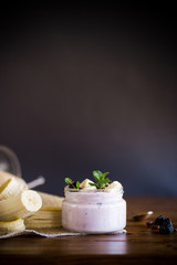 Fototapeta na wymiar home sweet banana yogurt in a glass jar