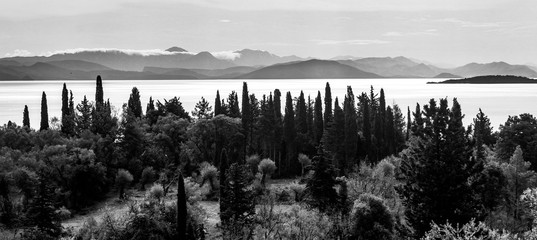 corfu panoramic landscape sea mountains cypress trees and island
