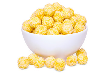 Crunchy yellow corn balls breakfast cereals in bowl