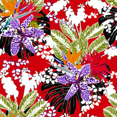 Floral seamless pattern with bright tropical leaves and exotic flowers. Abstract background texture.	