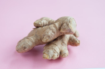  ginger close-up on a pink background. Immune support during an epidemic