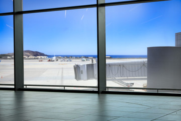 Summer background of airport and big window 