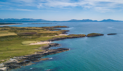 Aerial view of Aberffraw Bay and Snowdonia Mountains, Ty Croes, Anglesey, Wales, UK