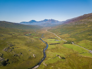 Aerial view of Snowdon Horseshoe Mountains and river Nant Gwryd, Plas Y Brenin, Capel Curig, Snowdonia, Wales, UK